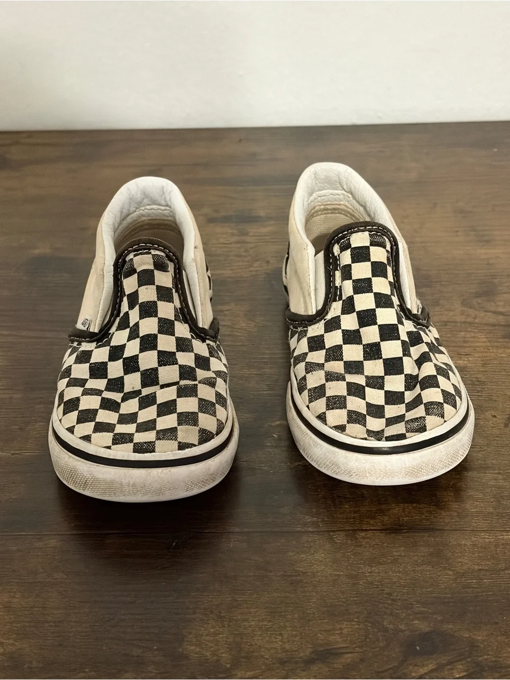 Vans Kids Slip-On Checkerboard Sneakers in Black and Cream
